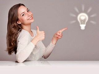 Woman pointing at Good Thinking bulb.